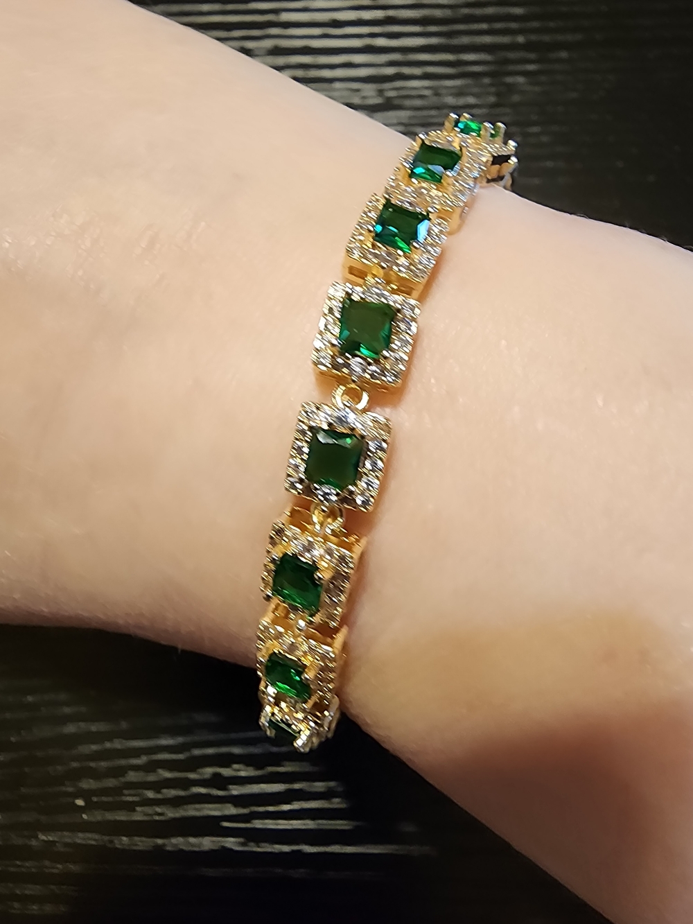 Gold-Tone Bracelet with Emerald Green Cubic Stones